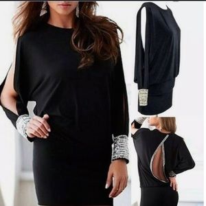 Mira international black dress with open back, long open sleeves, and jewels
